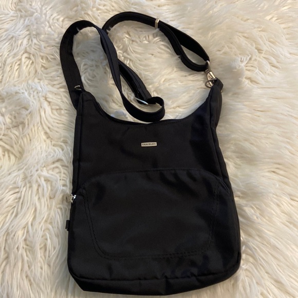Travelon Handbags - Travelon Nylon Crossbody Bag excellent condition black color